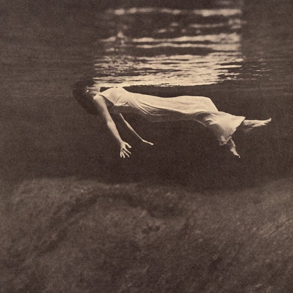 Undercurrent album cover showing a woman floating underwater